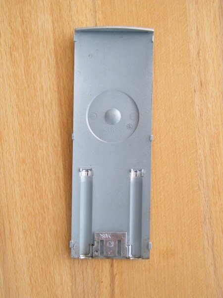 Gebrauchte Frontblende (silber/platin) mit Emblem, mittig, Jura C5